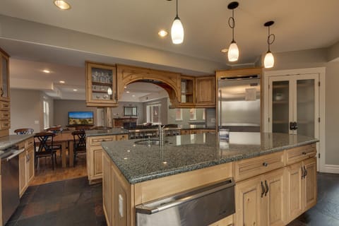 - Gourmet kitchen with granite island counter  
- Stainless steel Viking appliances included  
- Mountain cabin rental with chef style setup