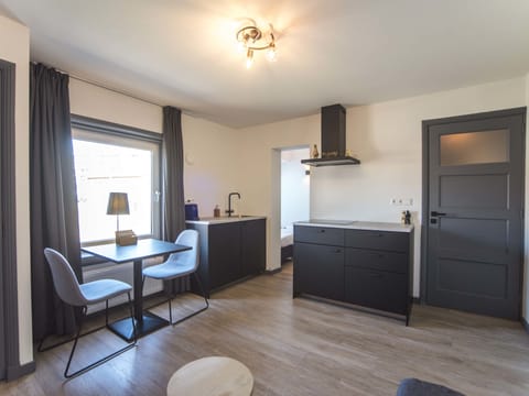 Private living room with fully equipped kitchen