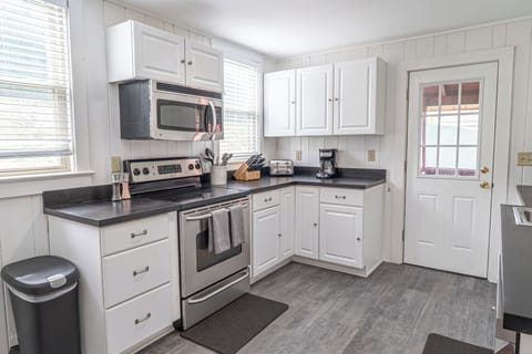 Full kitchen stocked with basic essentials 