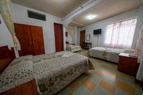 Standard Triple Room, Mountain View | 4 bedrooms, down comforters, blackout drapes