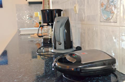 Εquipped with all the cooking utensils and electrical devices you might need