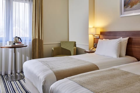 In-room safe, desk, iron/ironing board, free cribs/infant beds