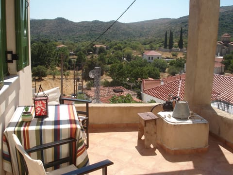 the terrace overlooking the village and the surrounding mountains