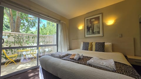 Luxury King Studio | Premium bedding, desk, soundproofing, iron/ironing board