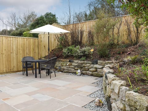 Patio area | Old Orchard Cottage, Trethurgy, near St Austell