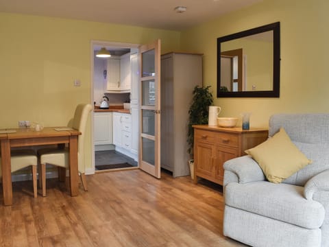 Living room with dining area | Old Orchard Cottage, Trethurgy, near St Austell