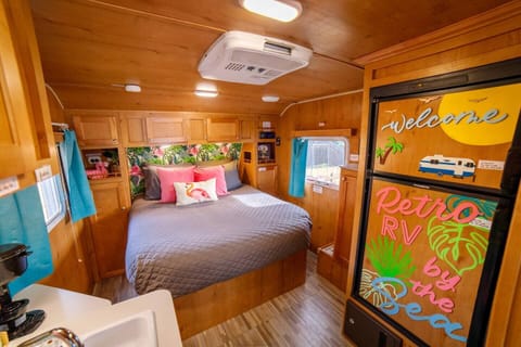 Take a load off by resting on our comfy Queen bed and grab a snack or beverage from the large refrigerator!