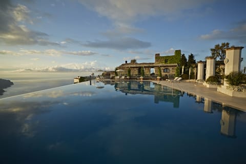 Seasonal outdoor pool, open 9:30 AM to 6:30 PM, free cabanas