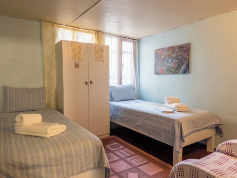 Economy Twin Room | Premium bedding, iron/ironing board (on request), WiFi (free)