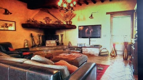 Duplex, 3 Bedrooms | Living area | TV