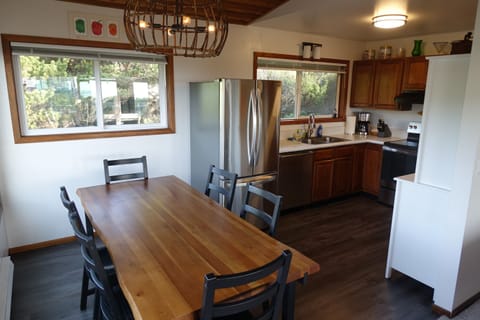 Upstairs dining space with views to savor and easy kitchen access.