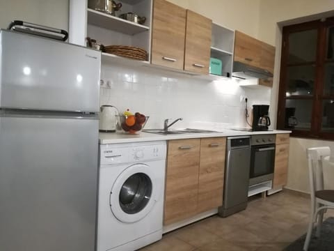 Fully equipped kitchen with all the necessary appliances and amenities.