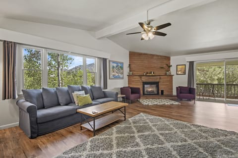 Extra Large Living Area with Electric Fireplace and sliding door to Balcony