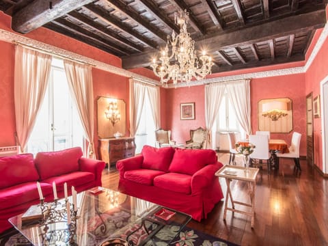 Deluxe Apartment (4 Bedrooms) | Living area | Flat-screen TV, fireplace