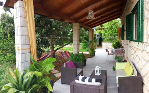 Outdoor space with lounge chairs, hammocks etc