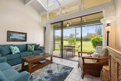 ChatGPT said:  Breezy living room opening to a sunlit patio for slow mornings & easy evenings.