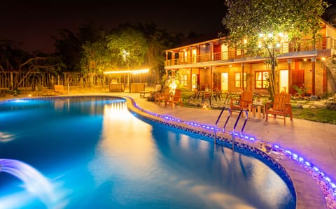 Outdoor pool, pool umbrellas, sun loungers