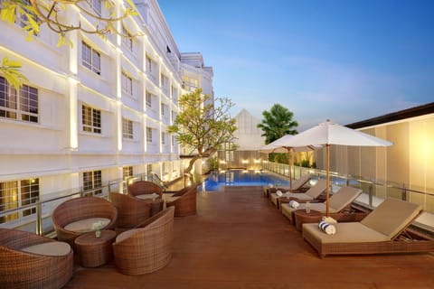 Outdoor pool, open 6:00 AM to 8:00 PM, pool umbrellas, sun loungers