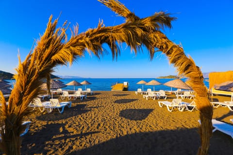 Private beach, black sand, beach shuttle, sun loungers