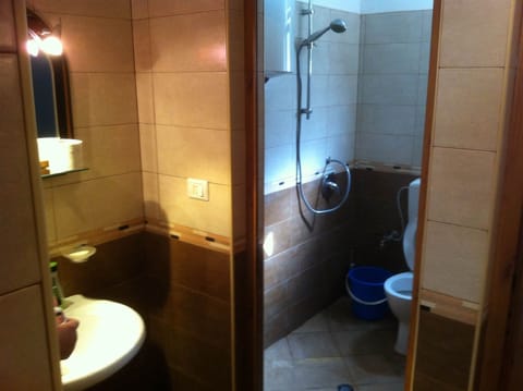 Triple Room, Shared Bathroom | Bathroom | Shower, towels, toilet paper