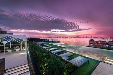 Outdoor pool, open 7:00 AM to 8:00 PM, sun loungers