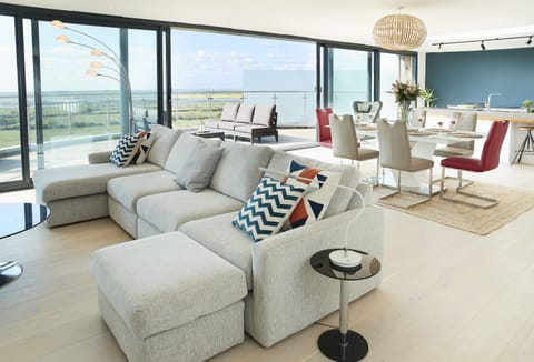 Second floor: South facing spacious open-plan sitting, dining room and modern kitchen
