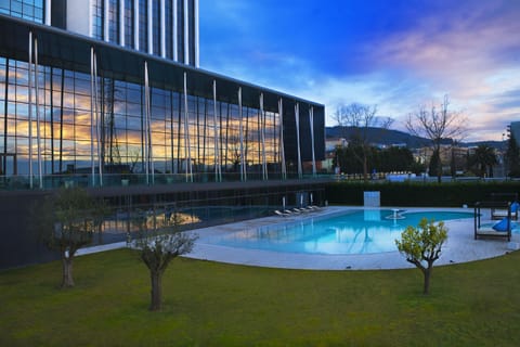 Indoor pool, seasonal outdoor pool, pool umbrellas