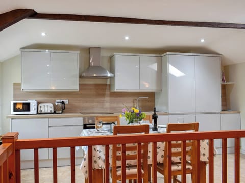 Well equipped gloss kitchen and dining area | 2 Swallowholm Cottages, Arkengarthdale, near Reeth