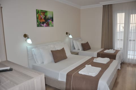 Standard Triple Room | Premium bedding, desk, blackout drapes, soundproofing