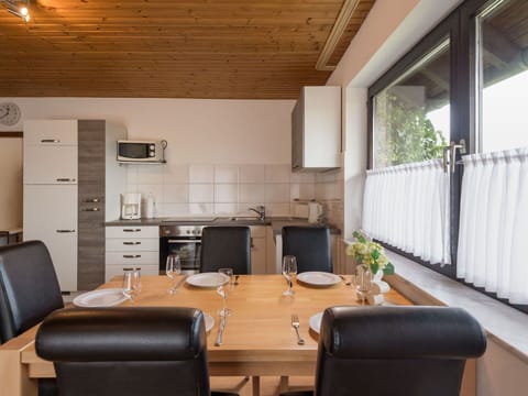 Property, Furniture, Table, Cabinetry, Wood, Chair, Plant, Countertop, Interior Design, Building