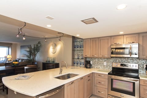 beautiful quartz counter top with glimmer - the Gulf as your view from kitchen