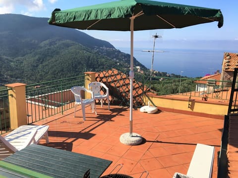 Sky, Property, Light, Shade, Outdoor Furniture, Mountain, Wood, Cloud, Leisure, Biome