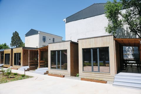 Comfort Townhome, Kitchenette, Pool View | Desk, soundproofing, iron/ironing board, free WiFi