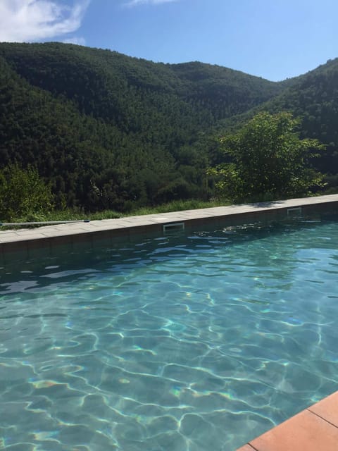 Seasonal outdoor pool, open 10:00 AM to 6:00 PM, sun loungers