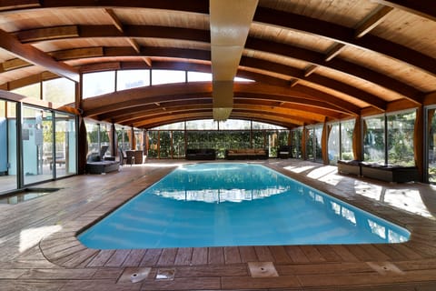 Indoor pool, open 10:00 AM to 10:00 PM, sun loungers