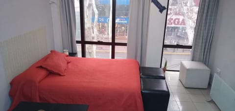 Apartment, City View (Parking) | Minibar, individually decorated, individually furnished, desk