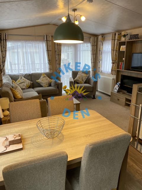 View of the Dining Area & Living Room Area as you walk in the door