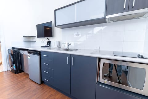 Two Bedroom Apartment | Private kitchen | Mini-fridge, microwave, coffee/tea maker, electric kettle
