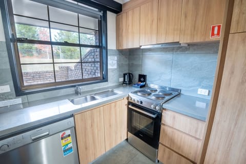 Three Bedroom Apartment | Private kitchen | Mini-fridge, microwave, coffee/tea maker, electric kettle