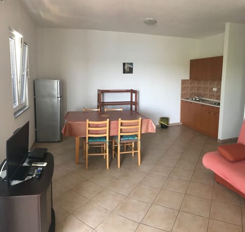 Classic Apartment, Sea View | Living area | TV