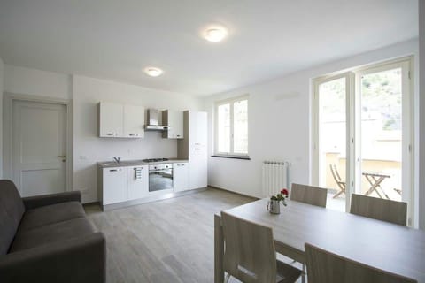 Large dining room with sofa bed and access to balcony 