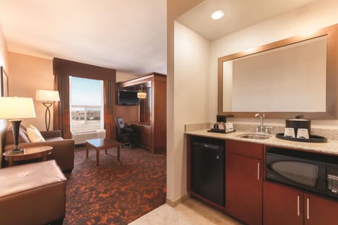King Studio Suite | Living area | 55-inch LED TV with cable channels, TV