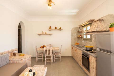 Villa | Private kitchen | Full-size fridge, oven, stovetop, coffee/tea maker