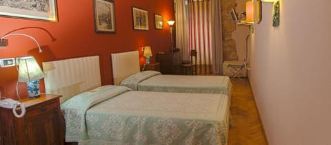 Classic Room, City View | Minibar, blackout drapes, soundproofing, iron/ironing board