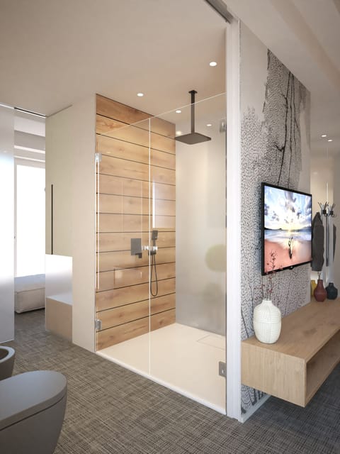 Exclusive Studio Suite, Sea Facing | Bathroom | Shower, hair dryer, towels, soap