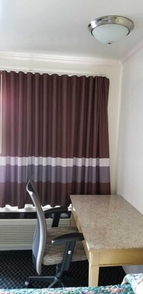 Desk, blackout drapes, free WiFi, bed sheets
