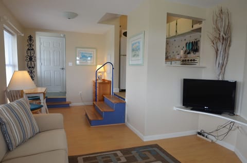 This condo has two entrances - balcony and poolside.  This is taken from the balcony entrance, poolside is to the left in this photo.  Bathroom is to the right of the poolside entrance.