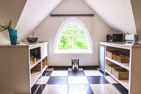 Loft Suite | Private kitchenette | Mini-fridge, electric kettle, highchair
