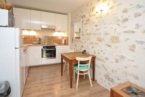 Kitchen and wall with stones