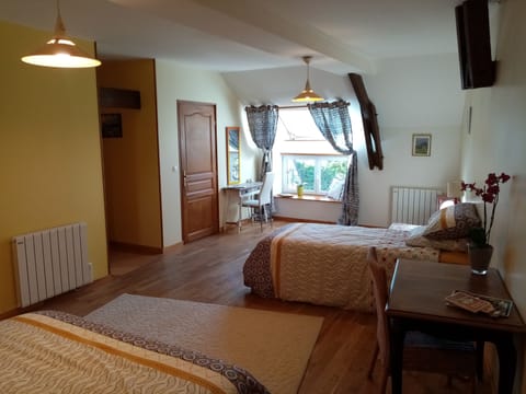 Family Triple Room, Garden View | Individually decorated, individually furnished, laptop workspace